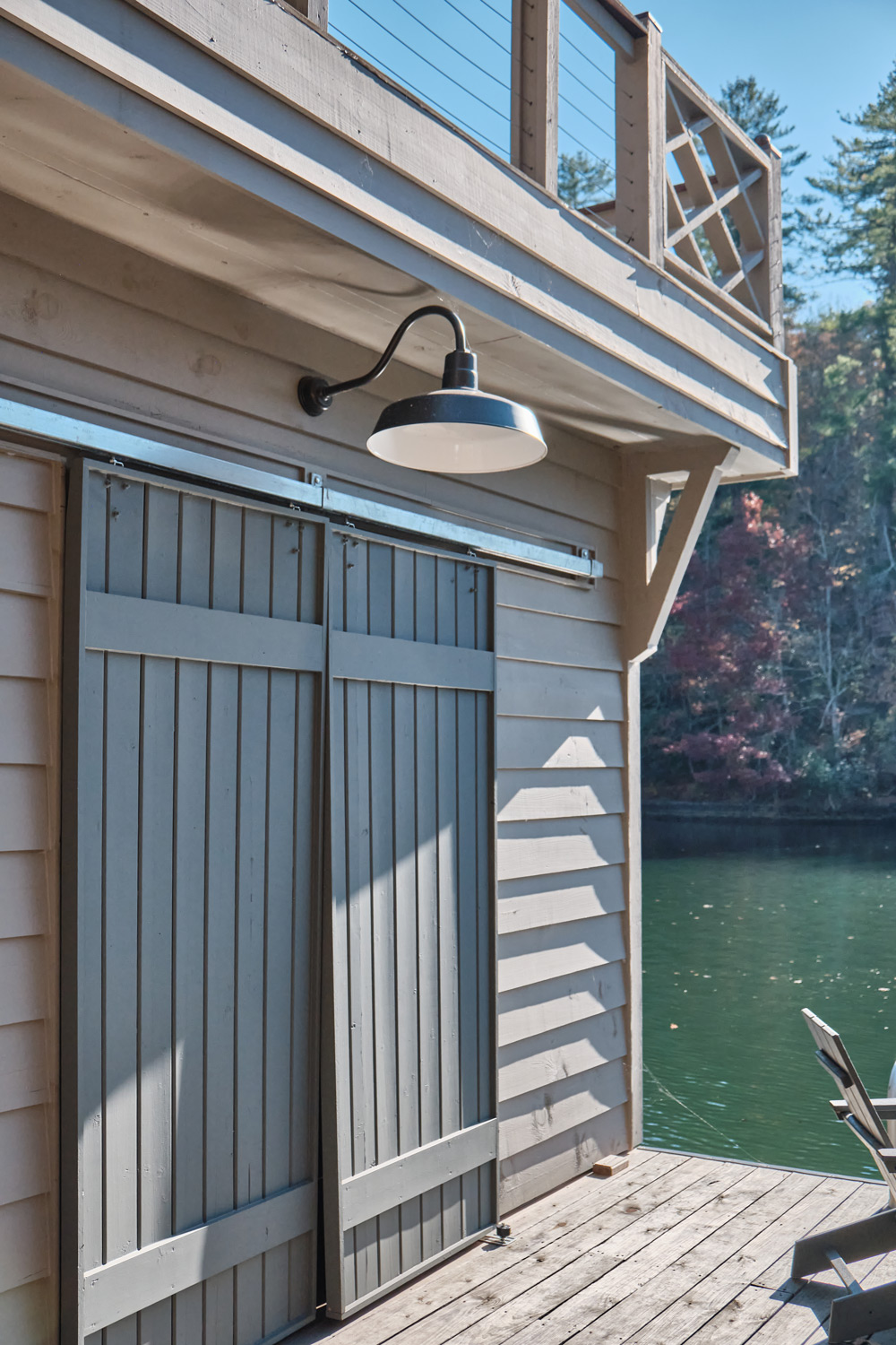lake burton boathouse lower deck sliding doors and barn light
