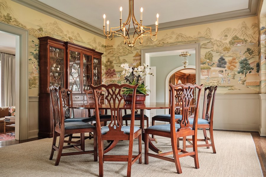 english country dining room with preserved wallpaper