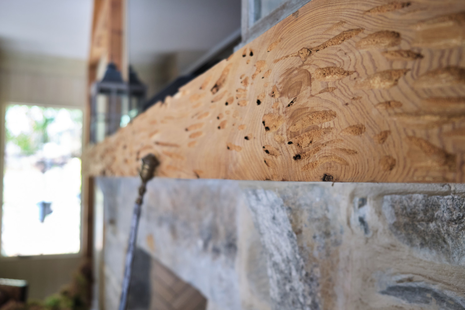 the detail of the wood fireplace mantel